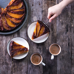 homemade chocolate cake with pears in rustic style - sweet food concept