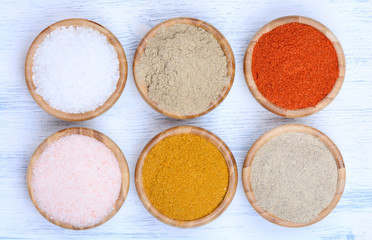 Bamboo bowls with spices on table