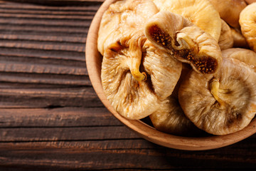 Dried figs on a dark rustic background