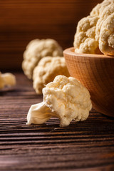 cauliflower and broccoli on a rustic background