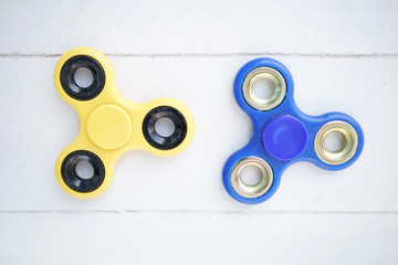 Two fidget spinner on white