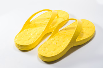 yellow slipper on white background