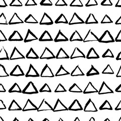 Vector abstract hand drawn seamless triangle pattern. Black and white doodle universal background made with watercolor, ink and marker. Trendy scandinavian design for fashion textile print.