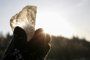 hand in glove keep ice cube, sun rays