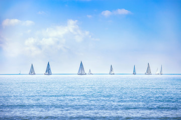 Sailing boat yacht regatta race on sea or ocean water - obrazy, fototapety, plakaty
