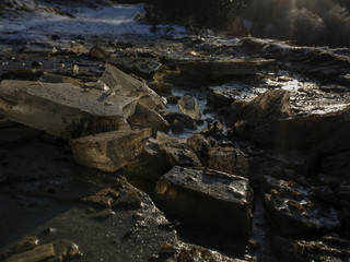 crushed ice blocks on winter mountain road