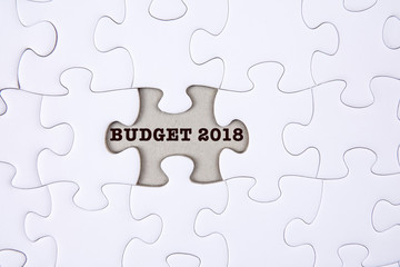 Fototapeta premium Business concept: Missing jigsaw puzzle with word BUDGET 2018.