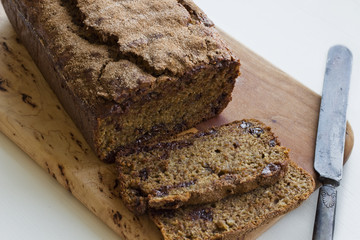 Sliced Banana Bread with a Rustic Knife