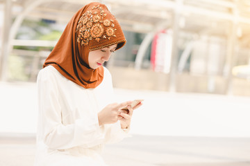 Portrait muslim young girl very happy with shopping in the city