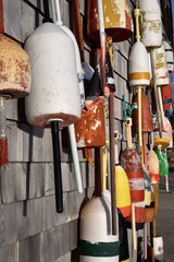 Buoys on a wall