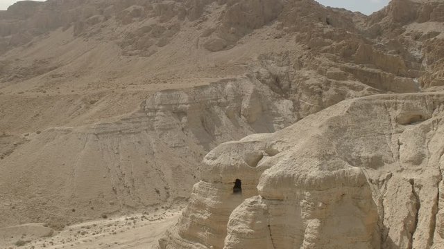 wide panning shot of cave 4Q at qumran site the dead sea scrolls in israel