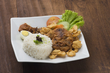 chicken steak with wooden background