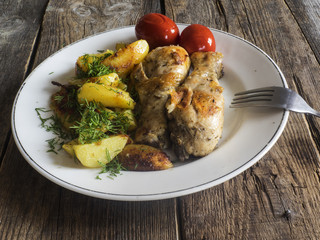 Fried chicken legs with potatoes