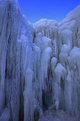 Fototapeta na wymiar Ice waterfall, natural landscape in winter