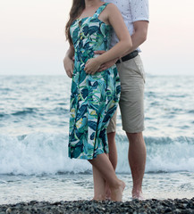 Young happy couple on the beach