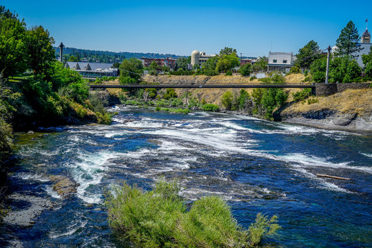 The stunning Riverfront Park in Spokane Washington shows off the sparkling waters of the Spokane River. © Richard