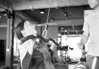 People exercising at fitness gym