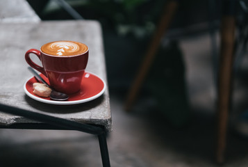 red coffee cup on the table