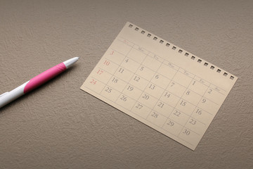 calendar planner or schedule arrangement on vintage paper background