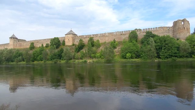 Fortress on the banks of the Narva river, day in august. The border of Russia and Estonia