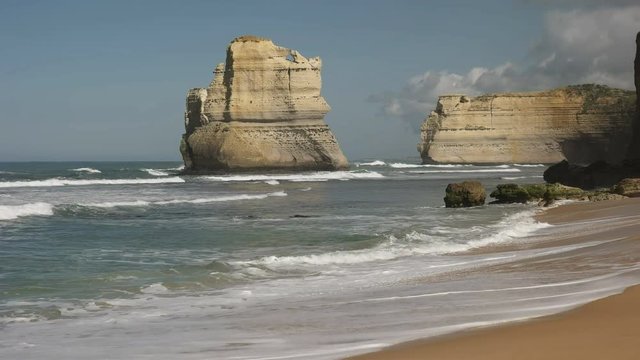 sea stack and headland at the twelve apostles from the beach at gibsons steps at port campbell on the great ocean road in victoria, australia