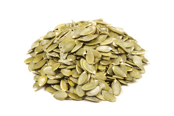 Pumpkin seeds on white background.