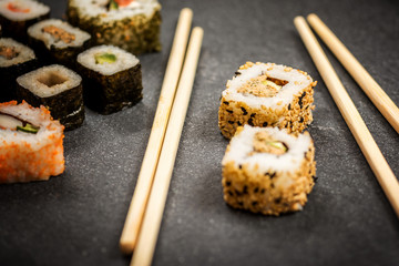 Sushi rolls hosomaki and uramaki