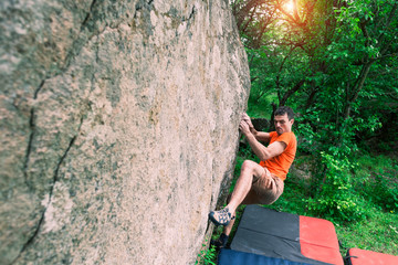 The climber is climbing bouldering.