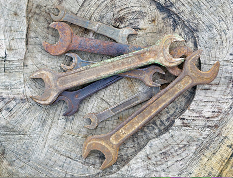 Spanners on a wooden background