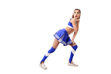 Fototapeta na wymiar Young cheerleader in blue and white suit on white background. Isolated on white background.