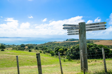 Signpost at the Shakespear Regional Park, Auckland Region, New Zealand.