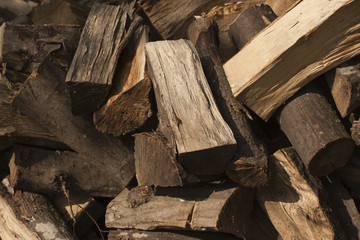 Firewood. Chop wood with an axe.