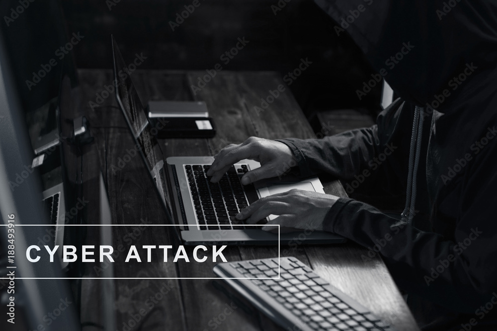 Aufkleber Internet crime. Hacker using laptop and hacking code password in dark room. Cyber attack concept
