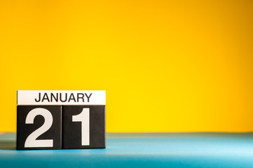 January 21st. Day 21 of january month, calendar on yellow background. Winter time. Empty space for text
