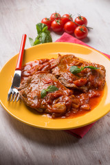 meat  with tomatoes sauce, selective focus