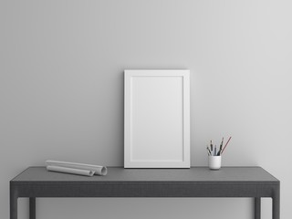 Blank picture frame templates on table in living room. Minimal style concept.