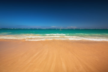 Caribbean sea and boat on the shore, beautiful panoramic view