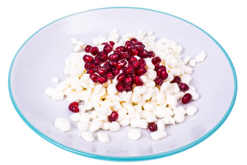 Healthy food. Delicious homemade cottage cheese with pomegranate seeds