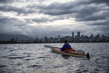 Kayaking in Vancouver during Dramatic Sunrise