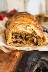 Pork roll - spicy sausage meat with chillies and beans in puff pastry