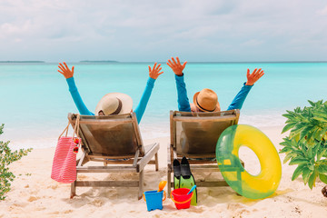 happy couple relax on a tropical beach