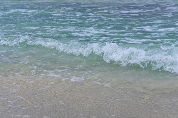 sea wave with foam close-up