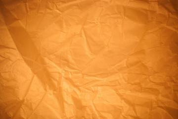 Brown crumpled paper background.