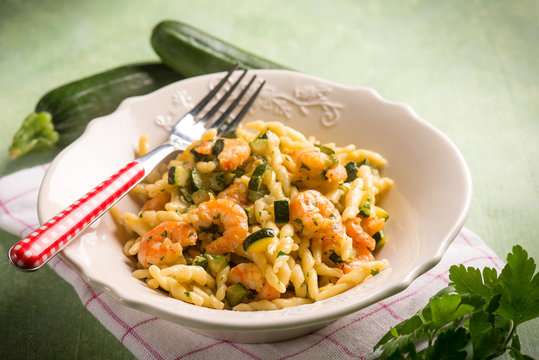 trofie with zucchinis and shrimp, selective focus