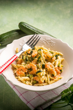 trofie with zucchinis and shrimp, selective focus
