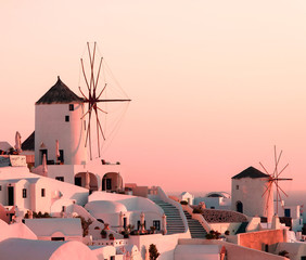 Classic landscape in Oia on Santorini island, Greece at sunset