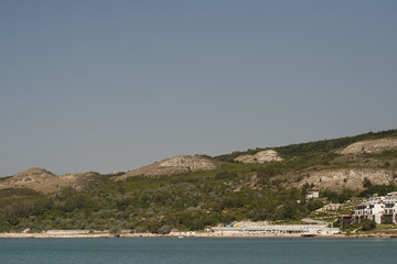 The resort is on the beach. Kavarna is a Black Sea resort in the Dobruja region of north-eastern Bulgaria.