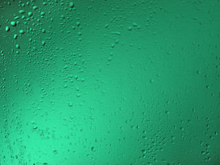 wet glass on a colored background. 