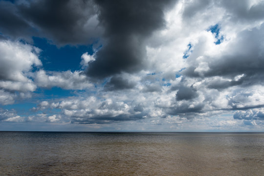 Fototapeta Clouds over Baltic sea.