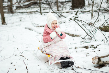 little girl eating sweet Christmas candy